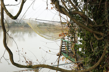Fishing on stilts on the Garonne river, France